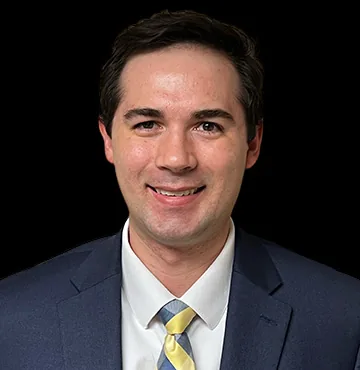 Andrew Giles, Attorney